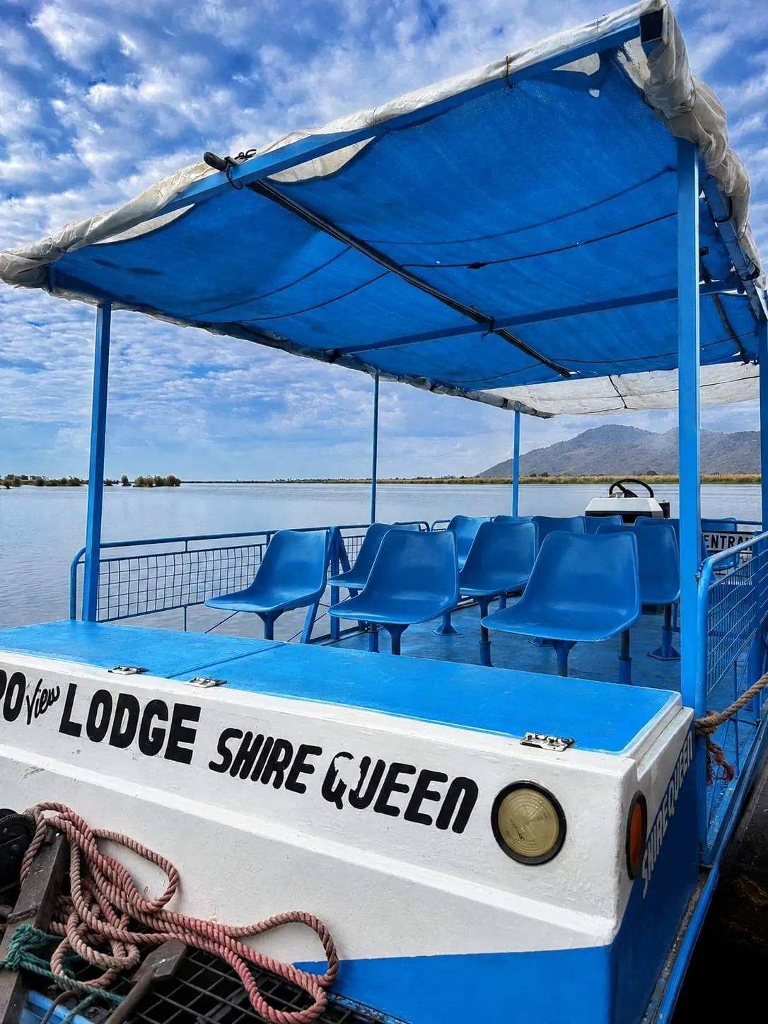 a boat and a jet ski riding in the lake